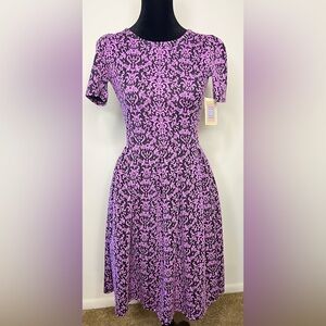 NWT LulaRoe Amelia dress in XXS, size 0-2. Pleated skirt bottom, pockets.